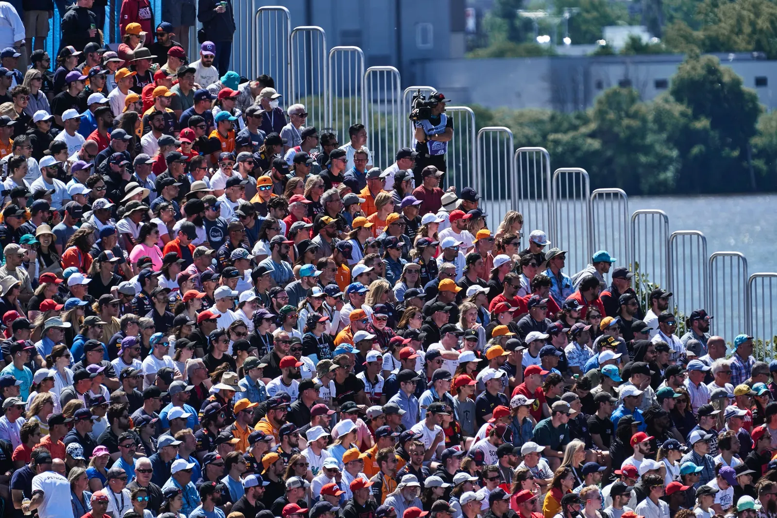 A packed Formula 1 grandstand on race day.