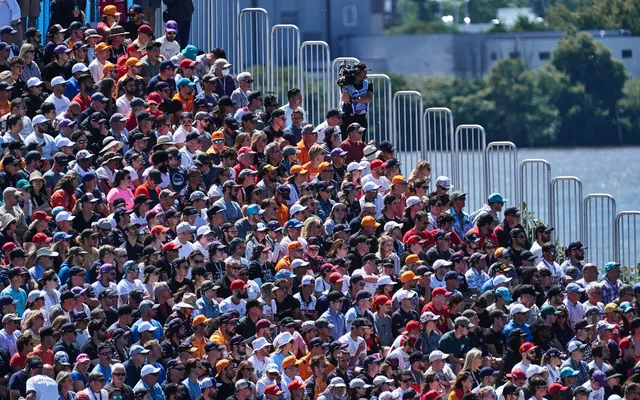 A packed Formula 1 grandstand on race day.