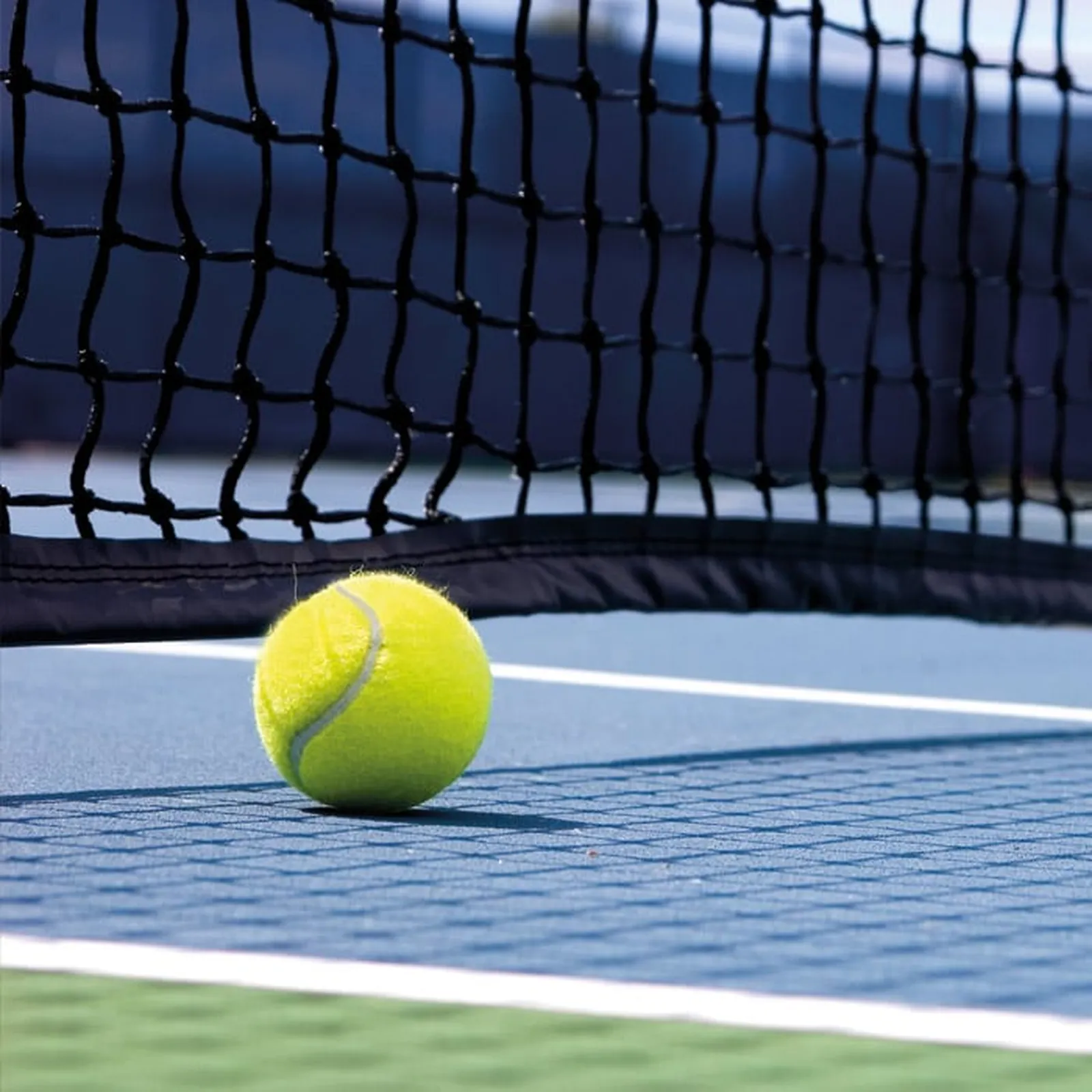 The match ball on the blue court.