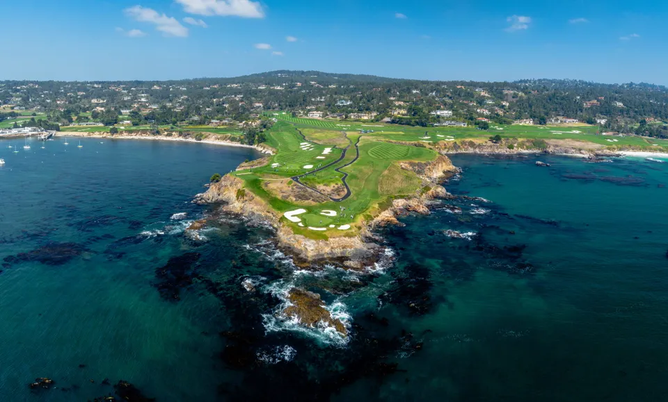 Pebble Beach from the air, the course along the cliffs and the ocean beyond.