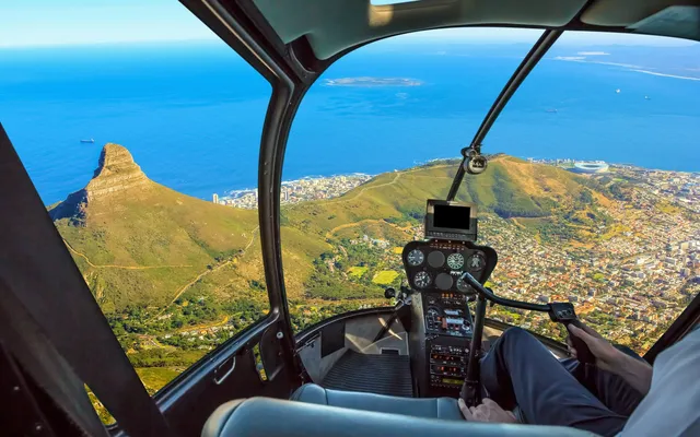 Over Lion’s Head by helicopter.