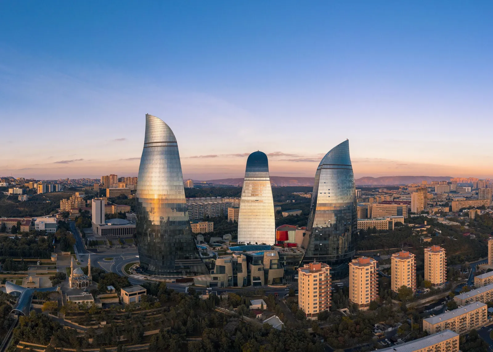 The Flame Towers above Baku at dusk.