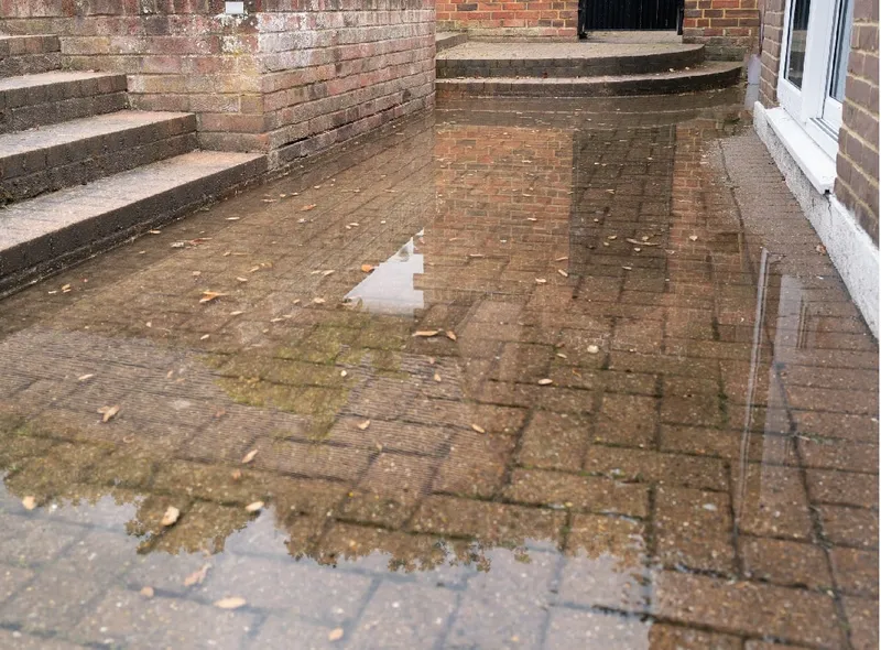 Blocked drain outside a council property