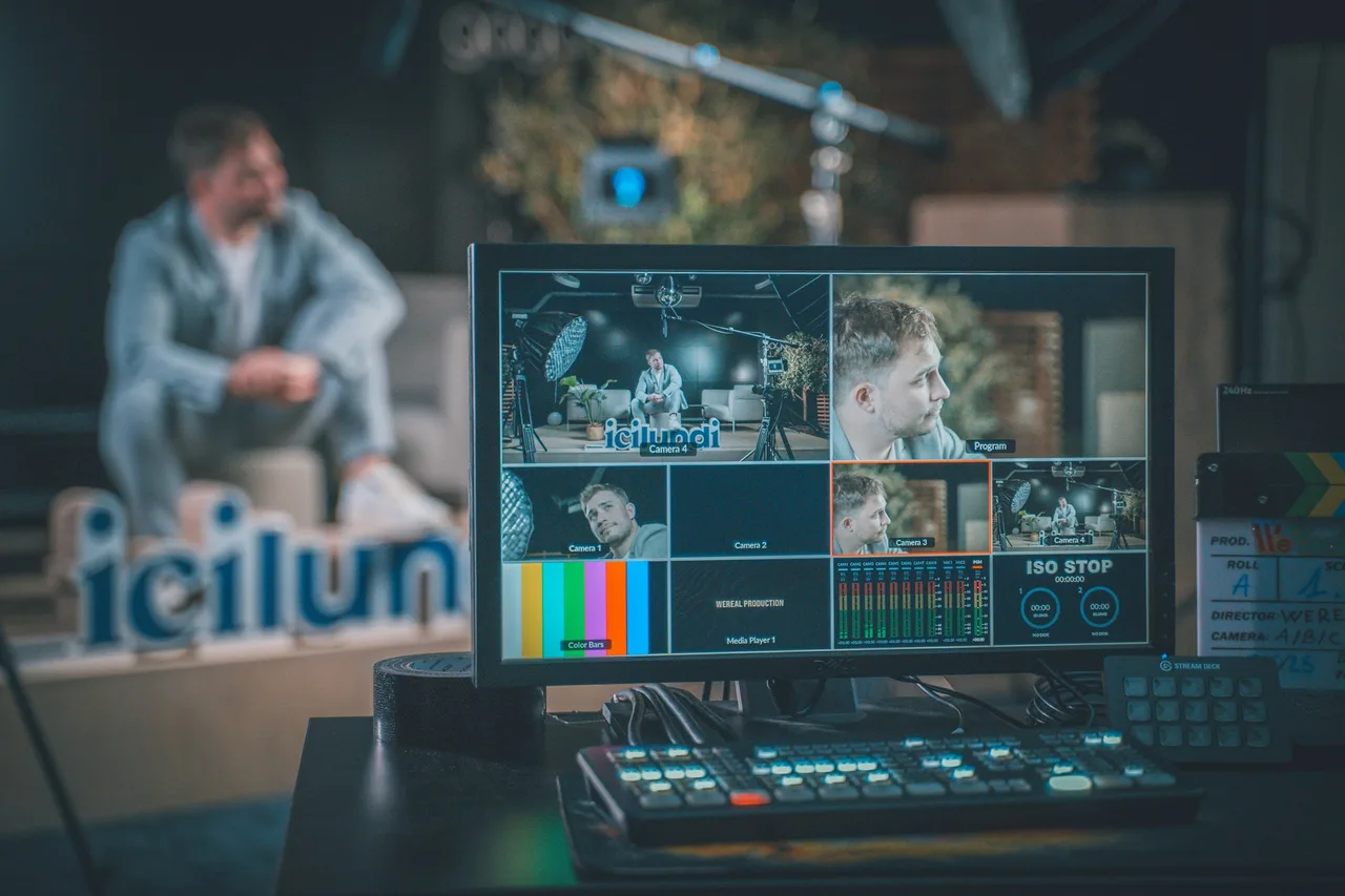 Video production control room with multi-camera monitor wall
