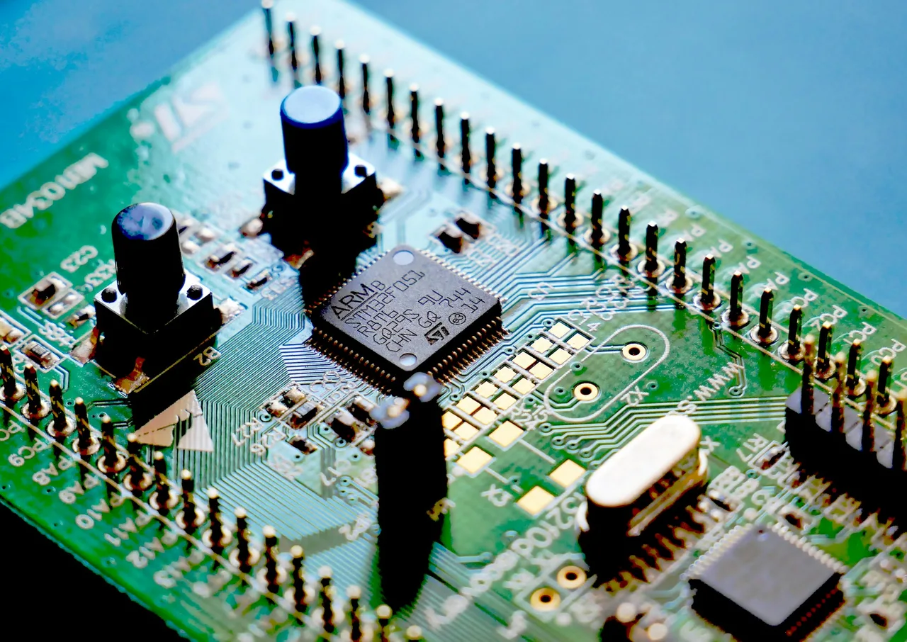 Close-up of an electronics circuit board with mounted components