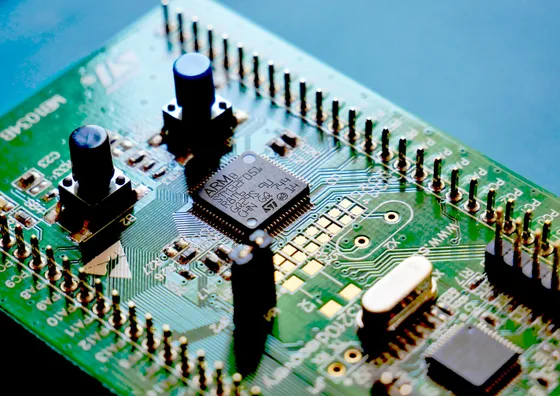 Close-up of an electronics circuit board with mounted components