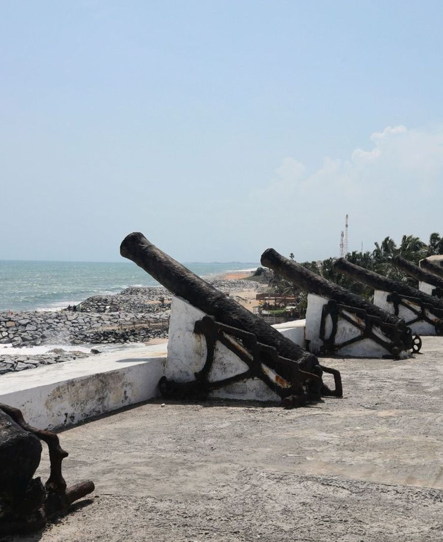Cannons along the fort ramparts overlooking the Atlantic at Cape Coast