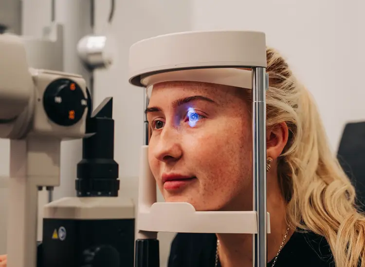 Young woman having an eye examination before laser eye surgery