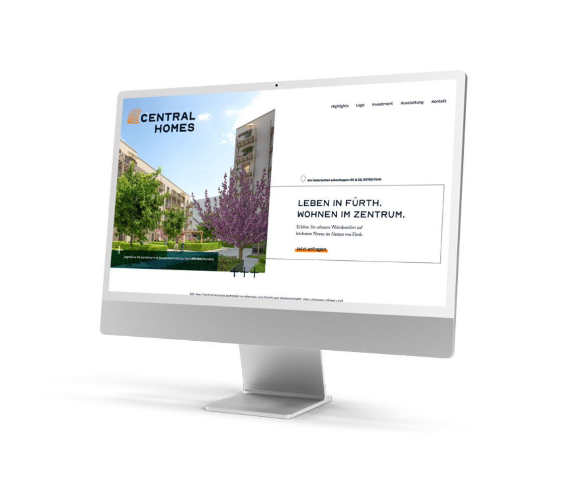 Silberner iMac zeigt die Startseite der Central-Homes-Website