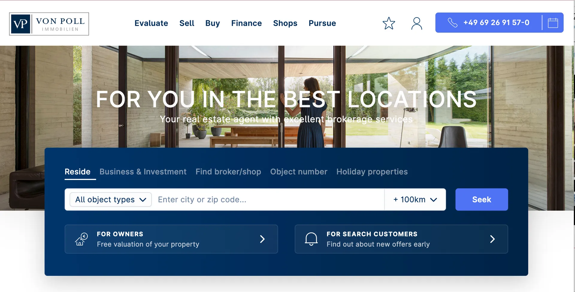 Real estate website homepage with search bar, navigation menu, and contact number. Glass doors open to a patio view.