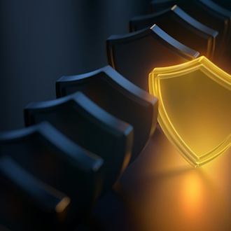 Glowing golden shield among dark shields