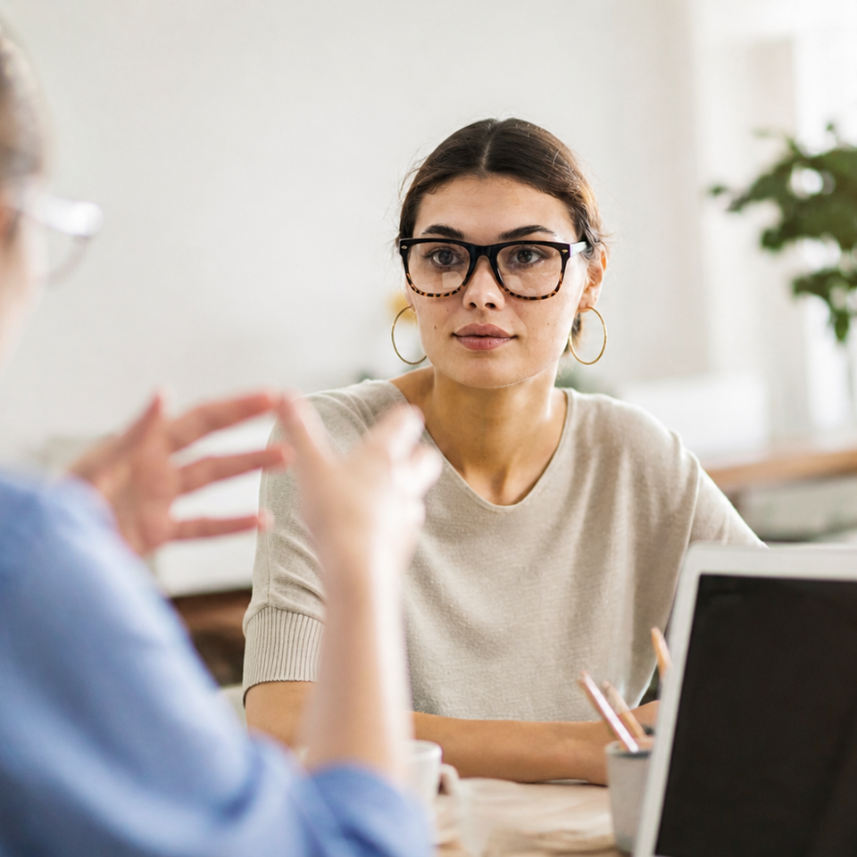 Woman on Laptop having conversation