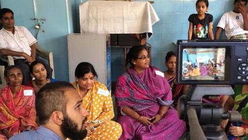 MBA students working on social impact projects and initiatives