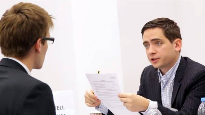 Hiring manager interviewing business student