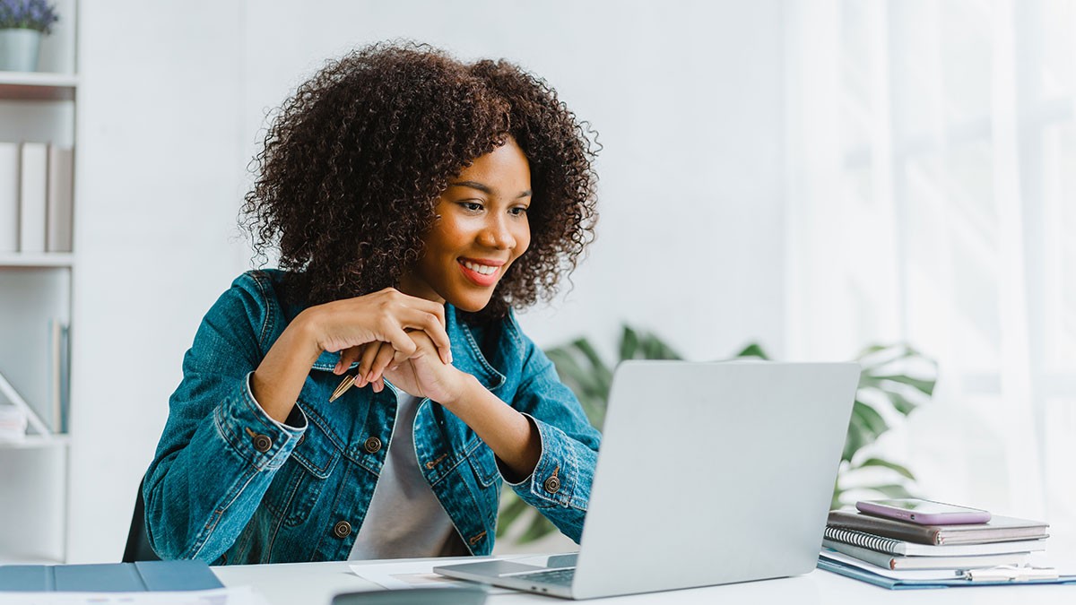 Young girl using a laptop