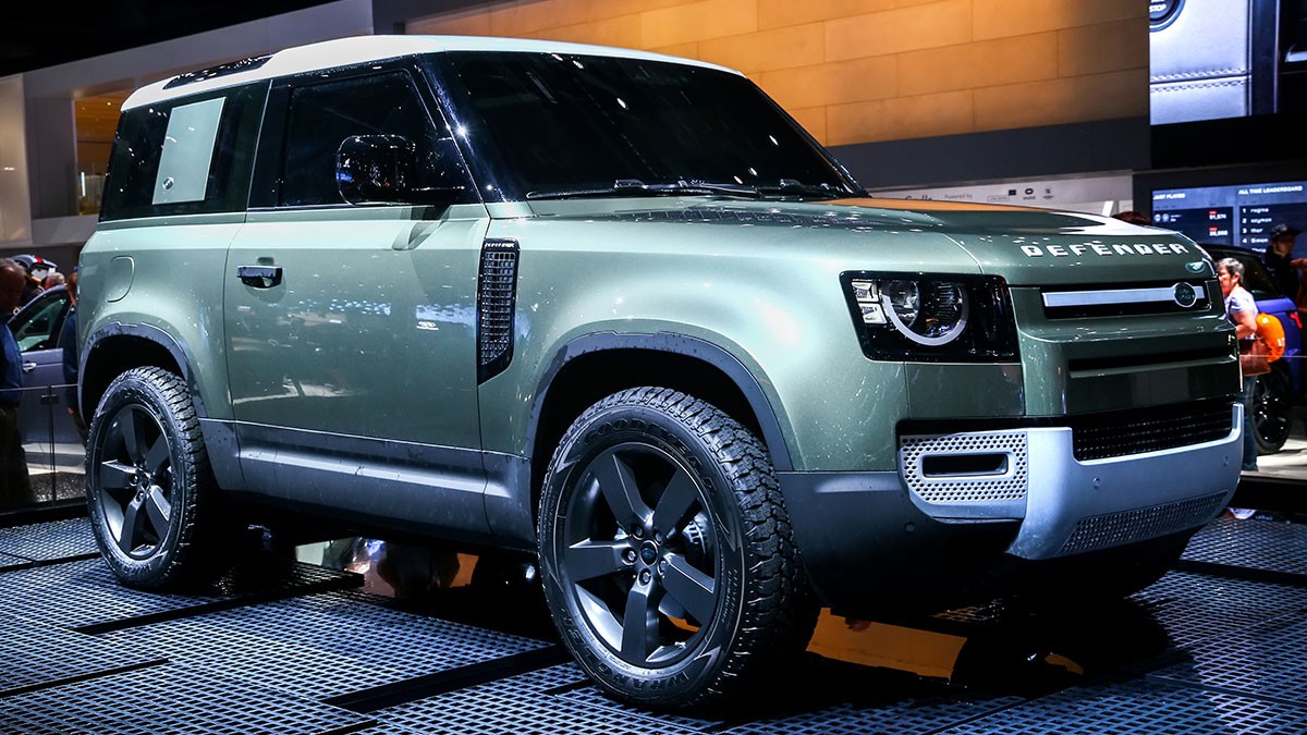 Land Rover Defender 90 parked at an auto show