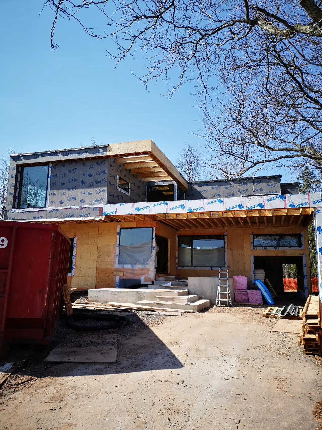Two-storey residential addition and exterior structural shell
