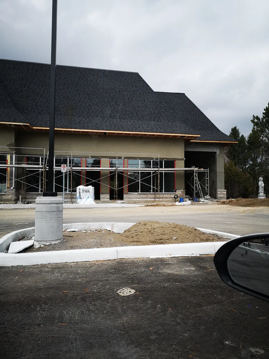 Large non-residential or institutional-looking structure under construction