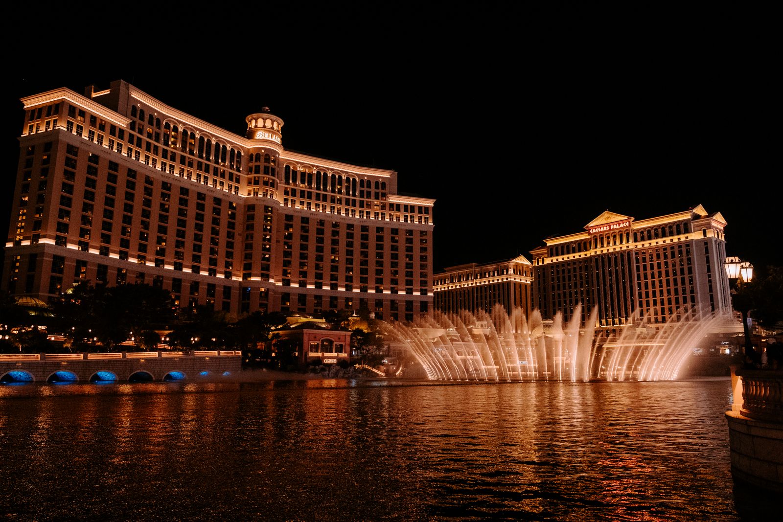 Bellagio fountain show at night in front of the Bellagio hotel on the center Las Vegas Strip