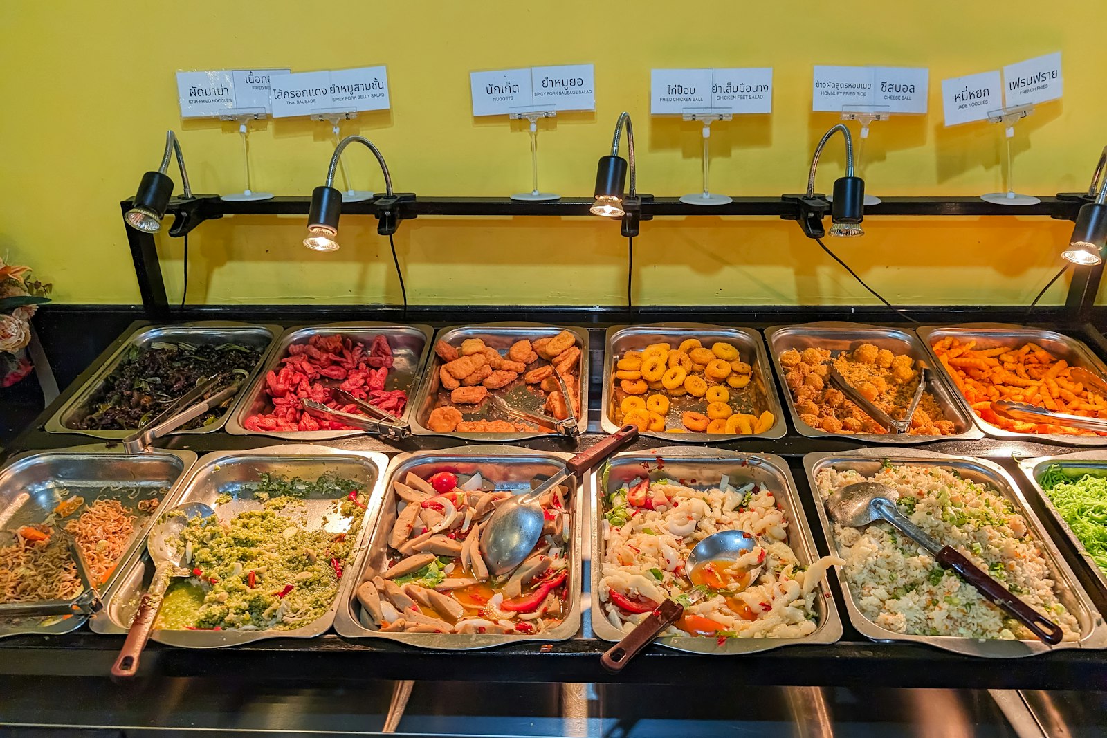 Buffet table filled with a wide variety of dishes