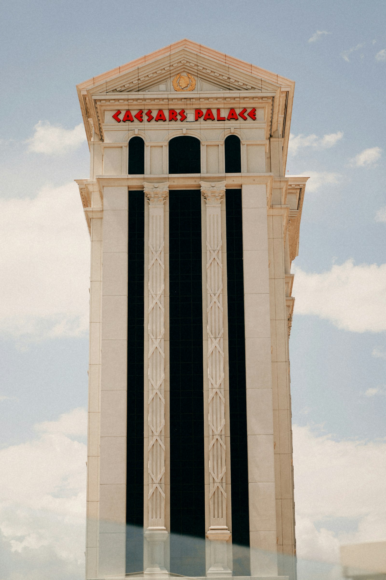 Caesars Palace hotel tower on the Las Vegas Strip against a blue sky, home of Bacchanal Buffet