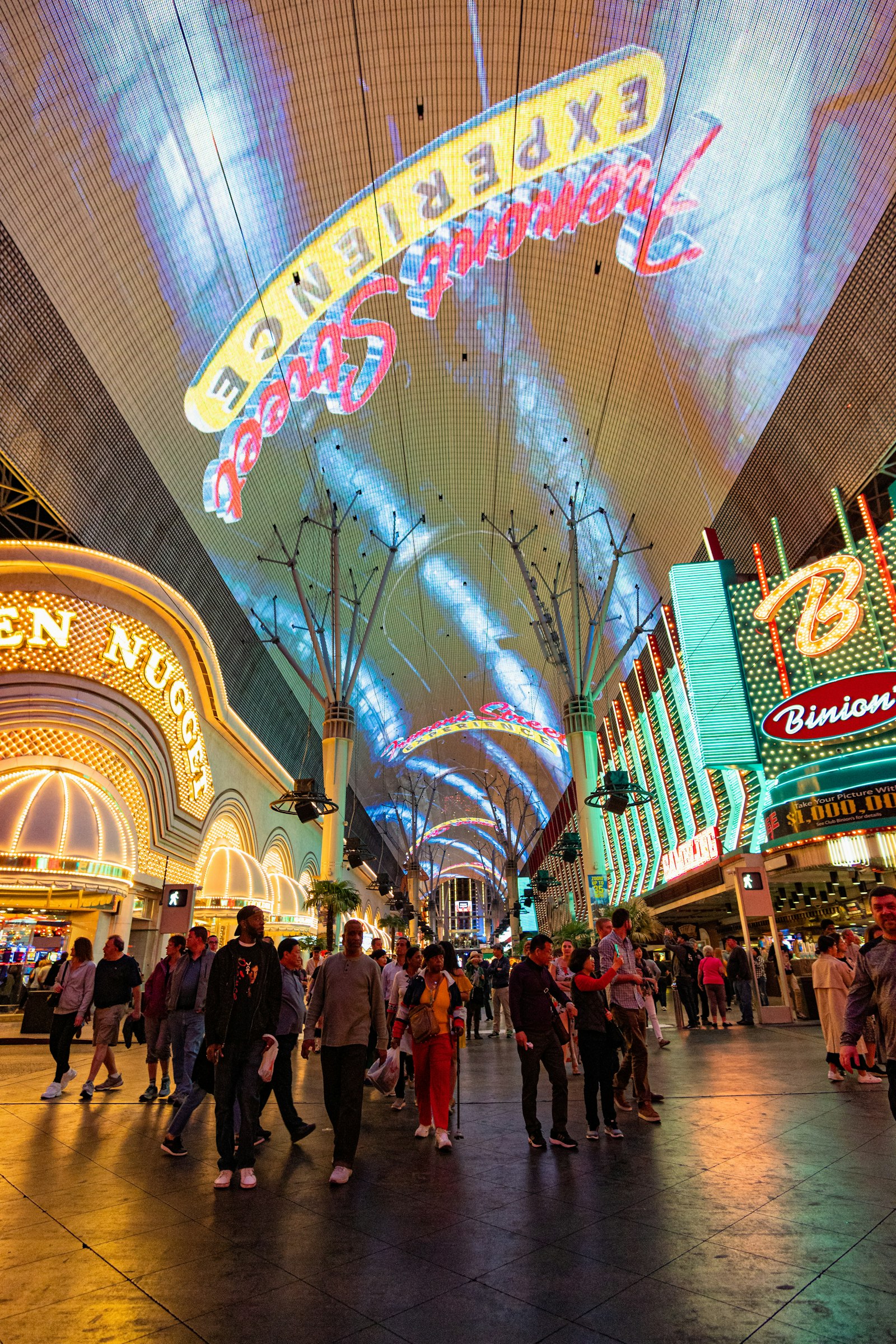 Crowds under the lights on Fremont Street in Downtown Las Vegas at night
