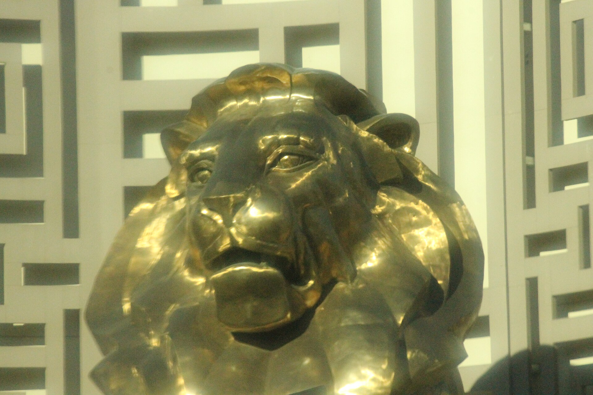 The large golden lion statue outside MGM Grand at the corner of Tropicana Avenue
