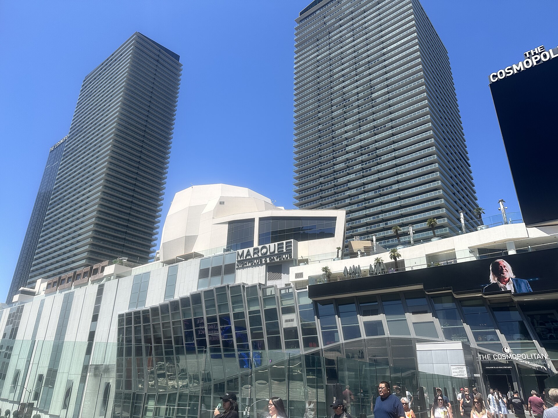 The Strip-side entrance of the Cosmopolitan with Marquee signage below its two glass towers