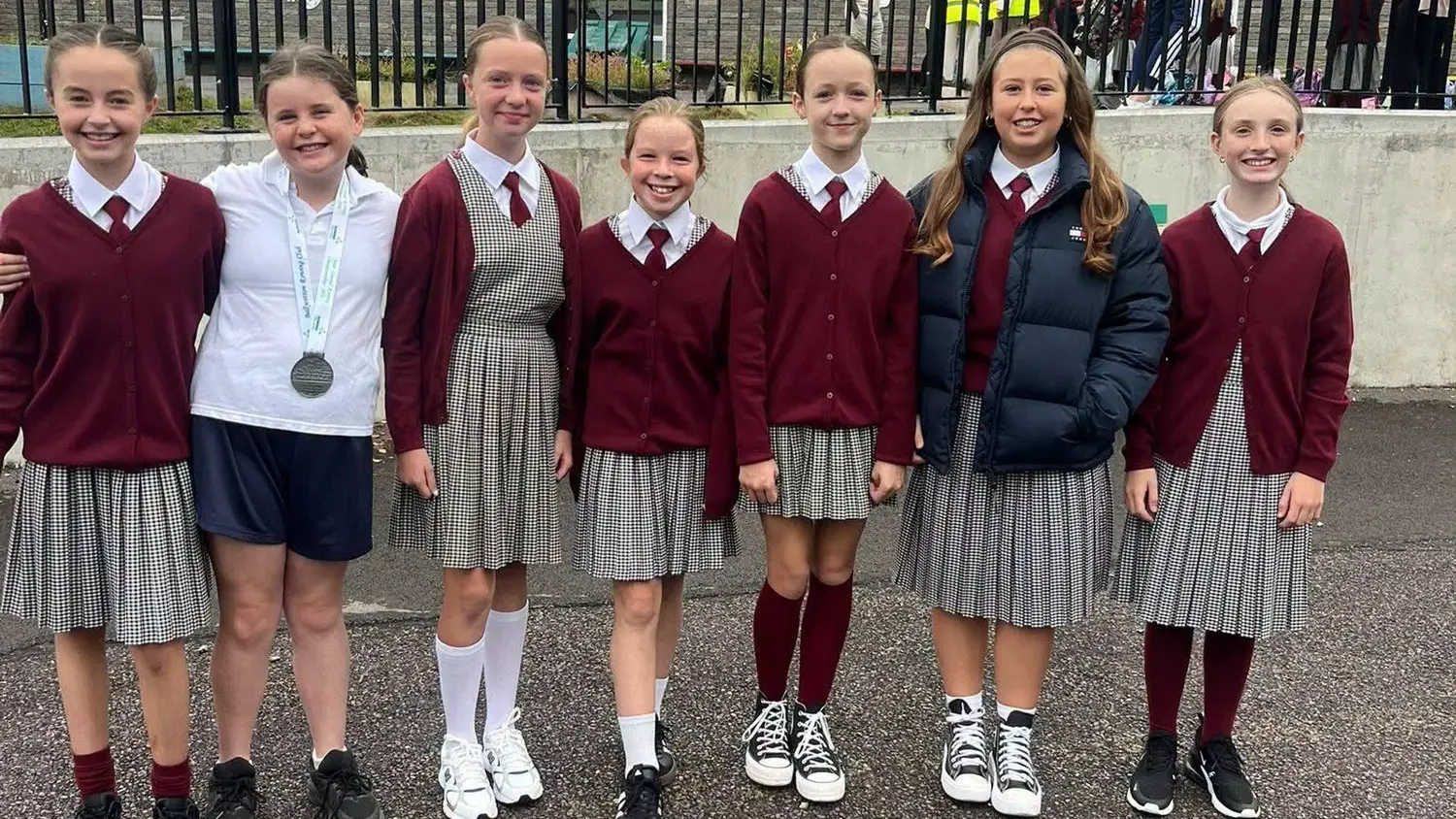 Pupils in uniform on the yard on the first day of the new school year