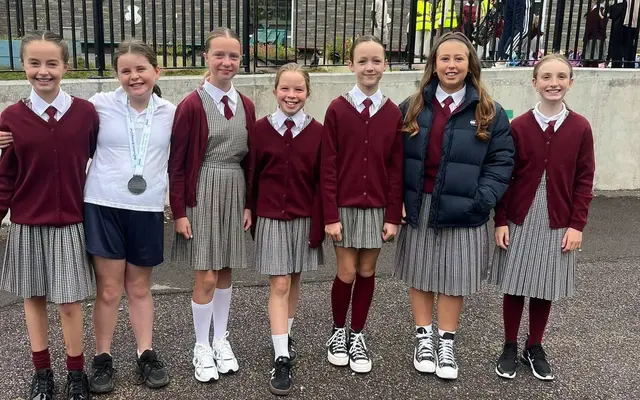 Pupils in uniform on the yard on the first day of the new school year