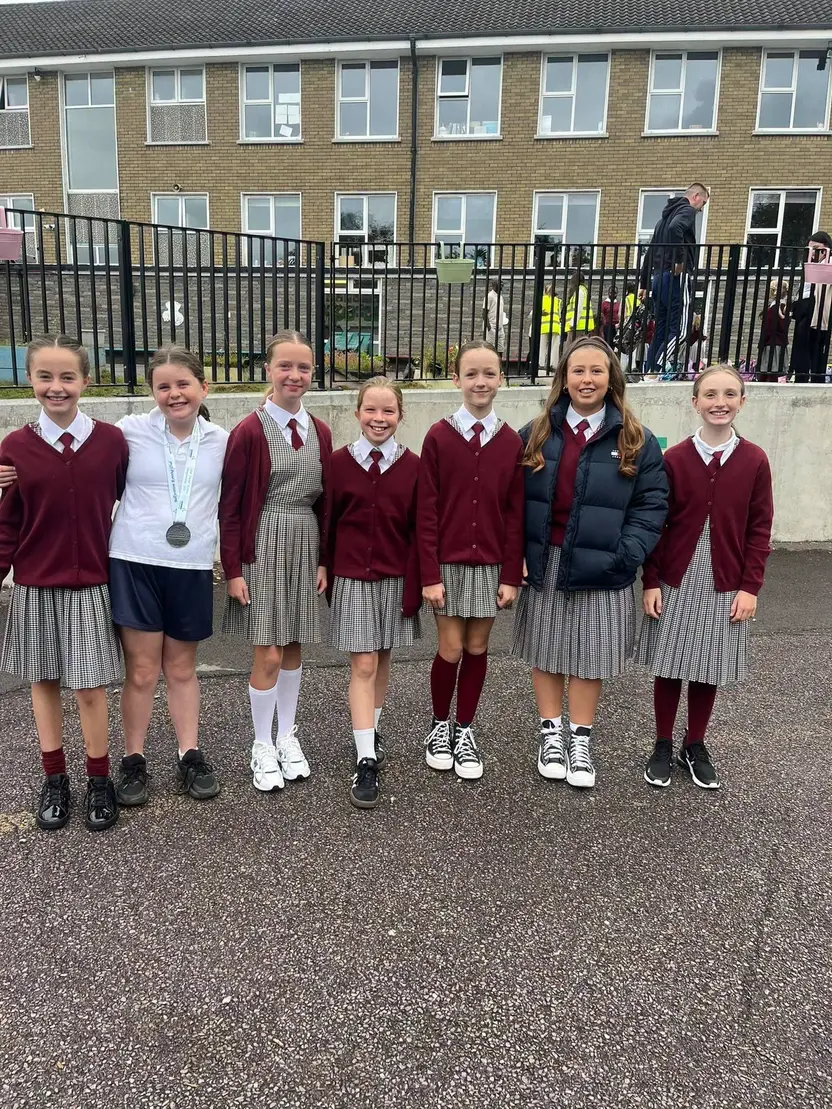 Pupils in uniform on the yard on the first day of the new school year