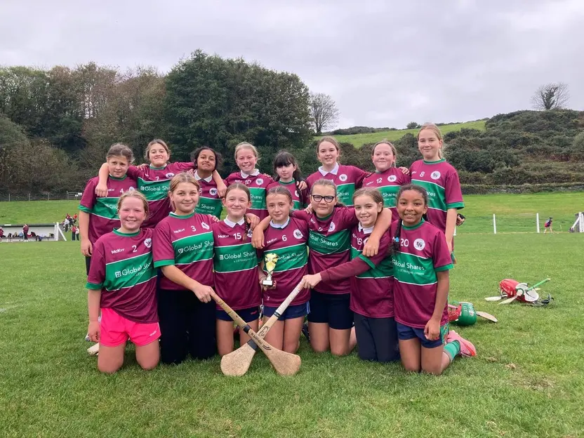 The school camogie team with a trophy