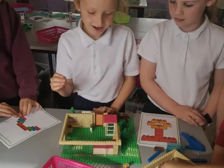 Pupils building with Lego