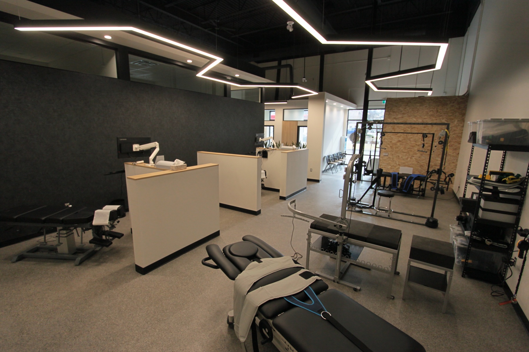 Inside 100+ Living Health Centres in Kelowna, showing the clinic equipment and treatment space.