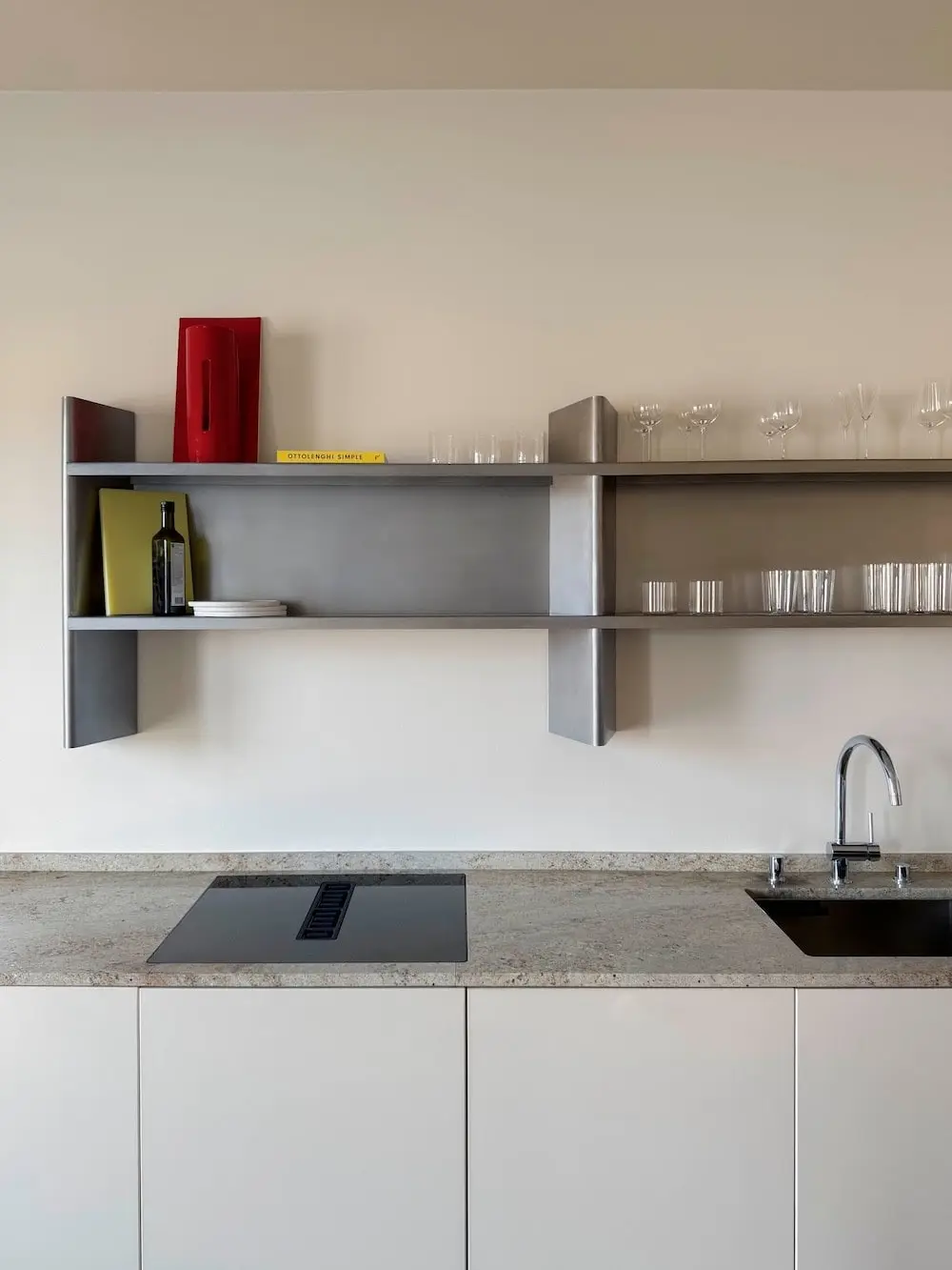BOBO Shelf with glasses and bottles above a kitchen worktop