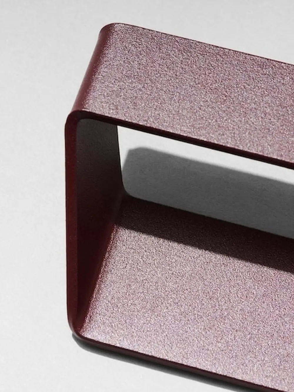 Close-up of a burgundy hanger