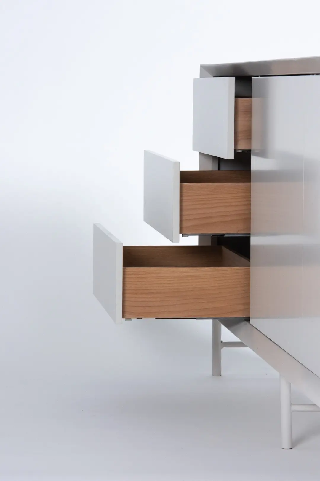Open oak-lined drawers of the Chamfer sideboard
