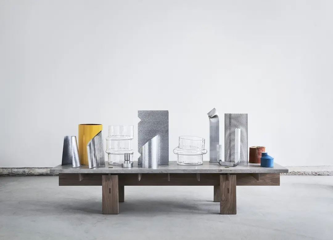 V.GW.01 vases among other objects on a low wooden table