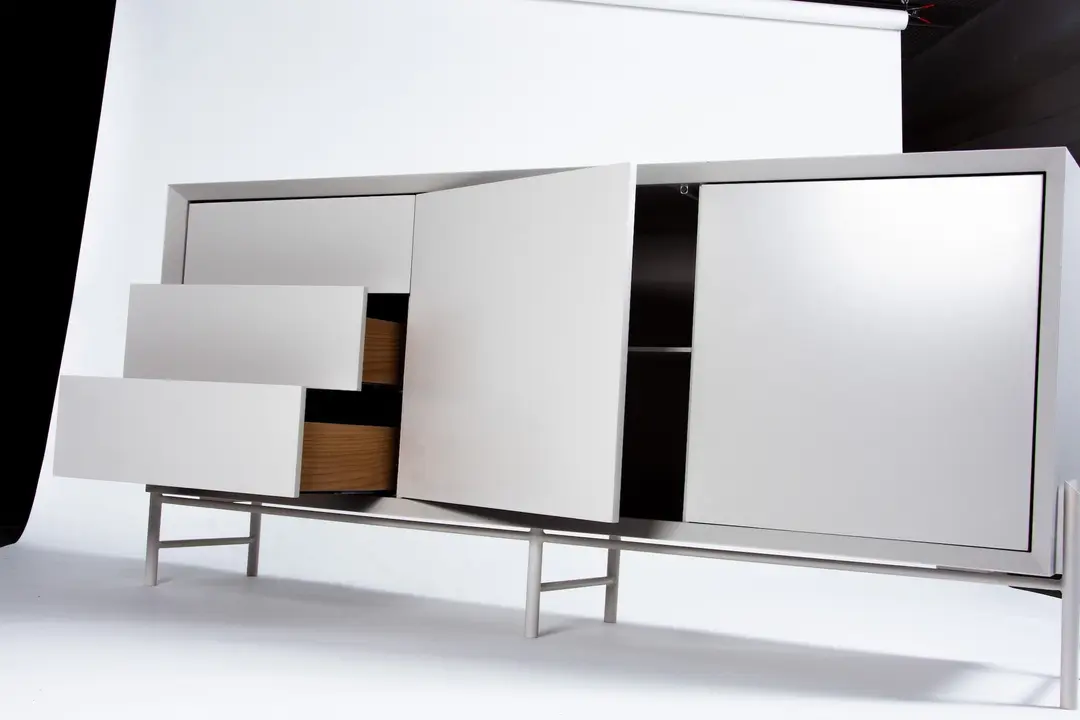 Chamfer sideboard with drawers and a door open