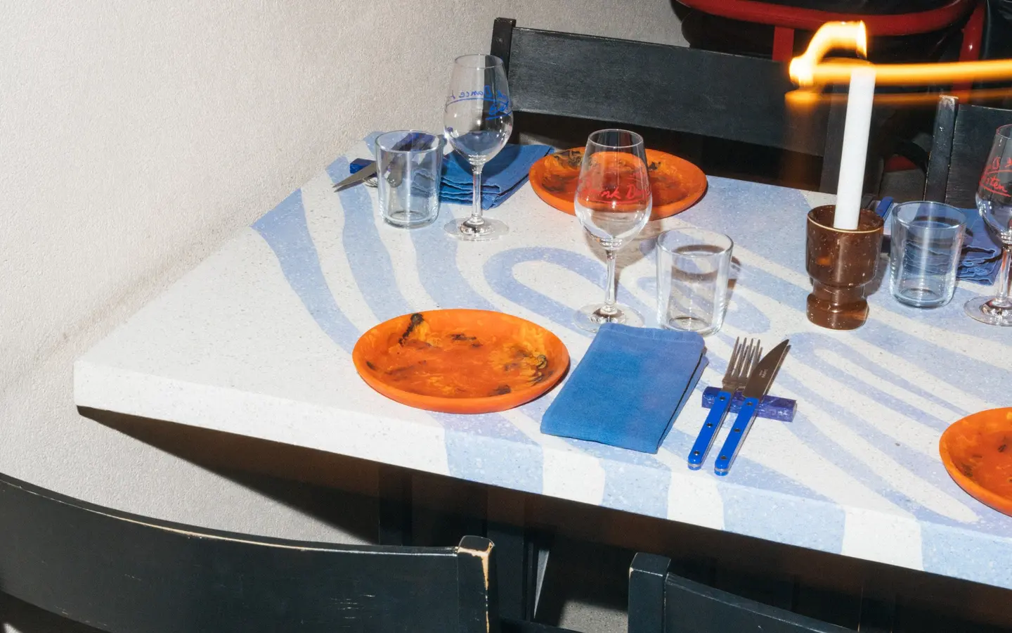 Set table at Hosoi with a blue and white terrazzo top