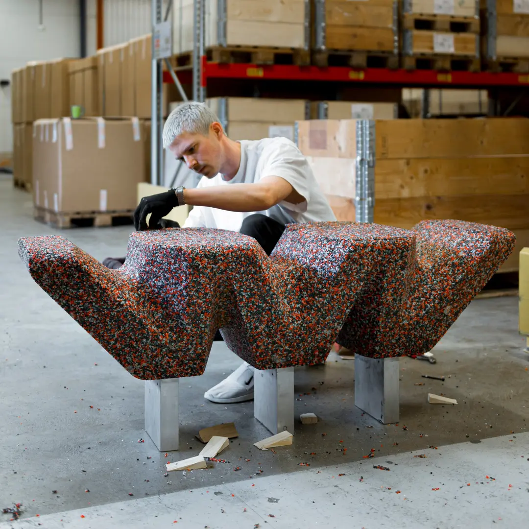 Gustav Winsth working on the speckled base in a warehouse