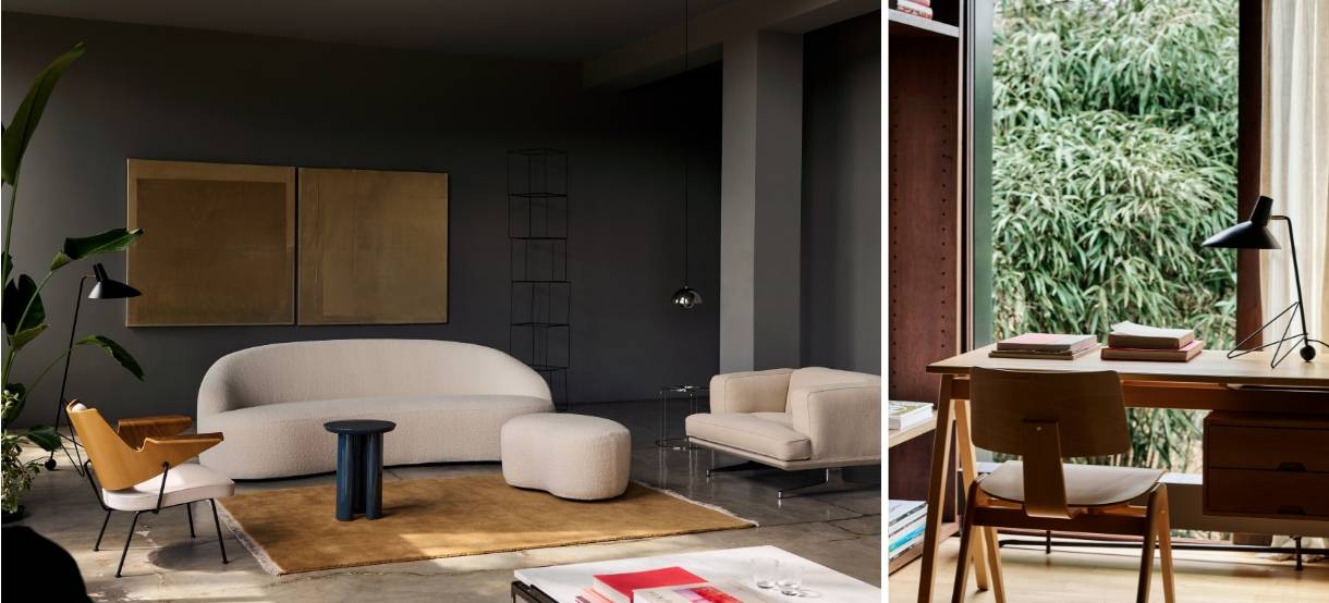 Stilfuld boligindretning med dæmpet belysning. Viser en mørk stue med skulpturelle møbler og en minimalistisk arbejdsplads ved et vindue med udsigt til natur, fremhævet af elegante bord- og pendellamper.