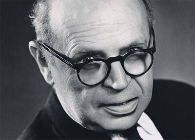 Cette image montre un portrait du designer Poul Henningsen.