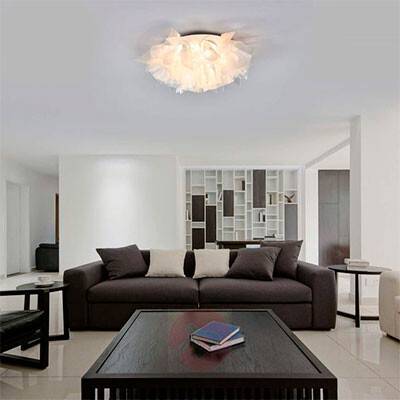 Dette billede viser en bølget lampeskærm lavet af det unikke Lentiflex materiale, som er et gennemsigtigt fleksibelt materiale