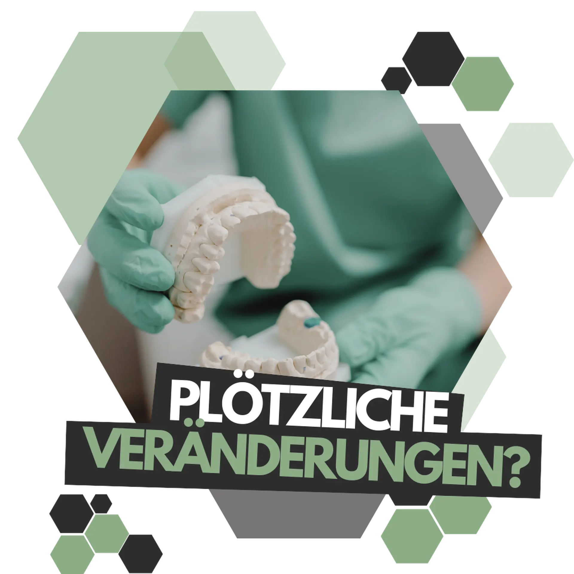 Ein Zahnarzt zeigt das Modell eines Gebisses
