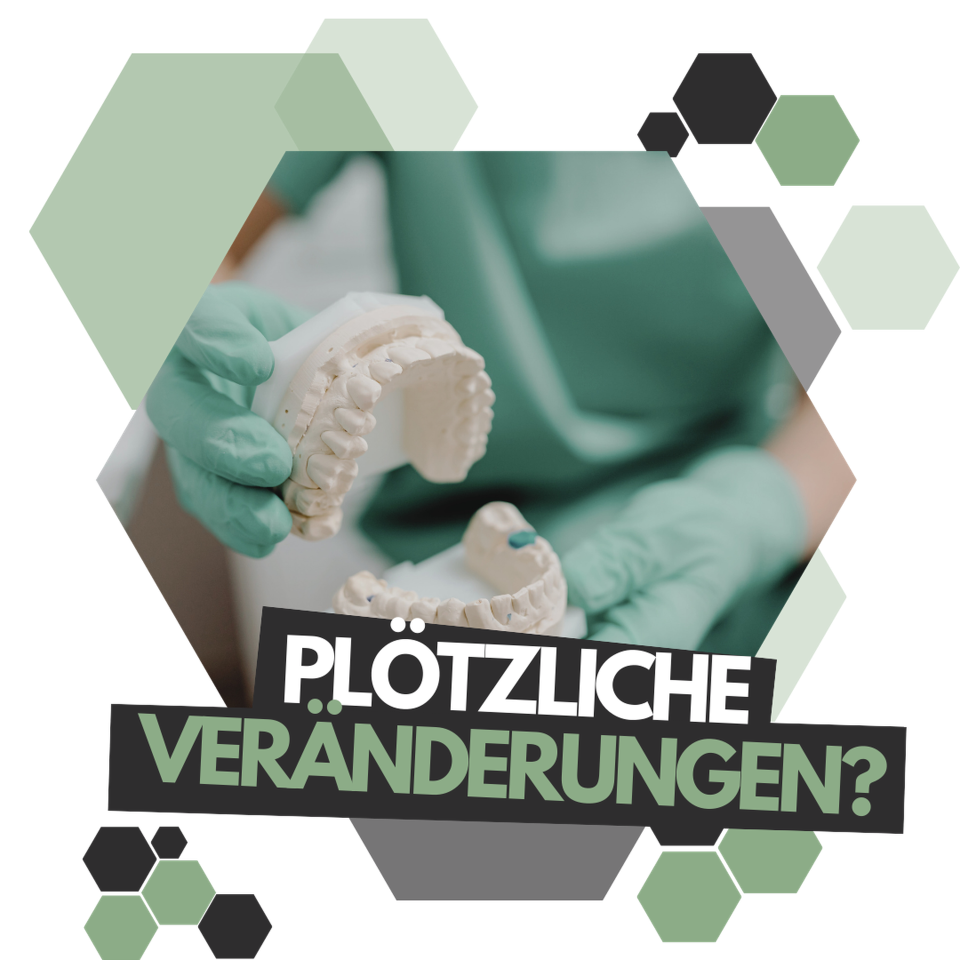 Ein Zahnarzt zeigt das Modell eines Gebisses