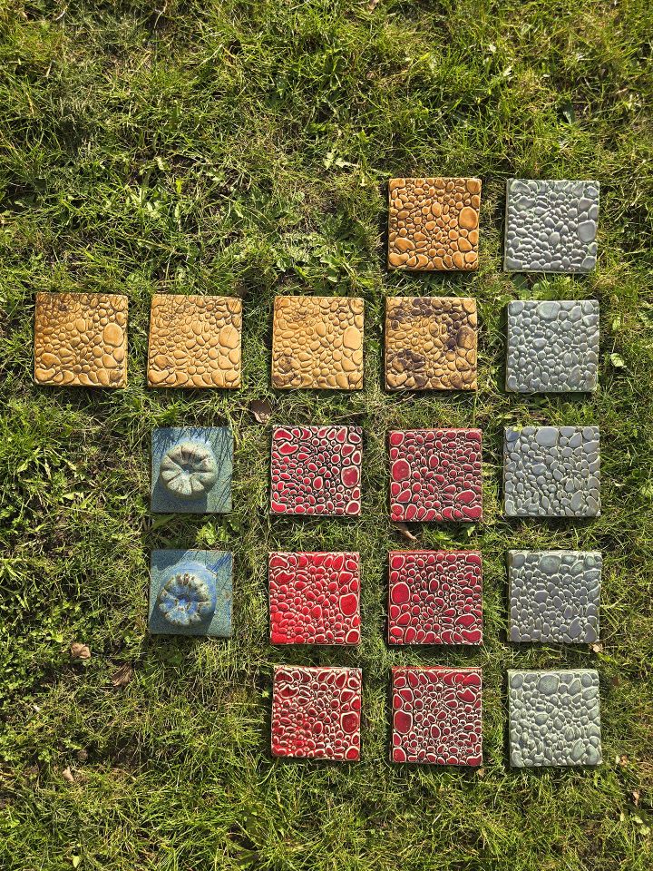 Colourful tiles on grass
