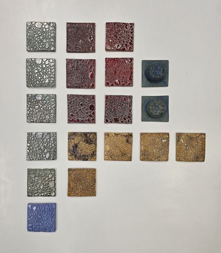 A group of tiles against a white backdrop