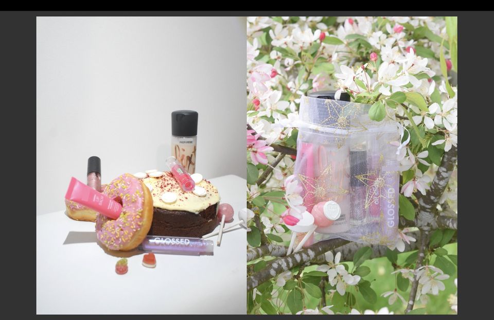 Photo of sweets and make-up next to bag of make-up hanging in tree