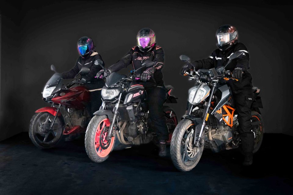 Photo of three women on motorbikes